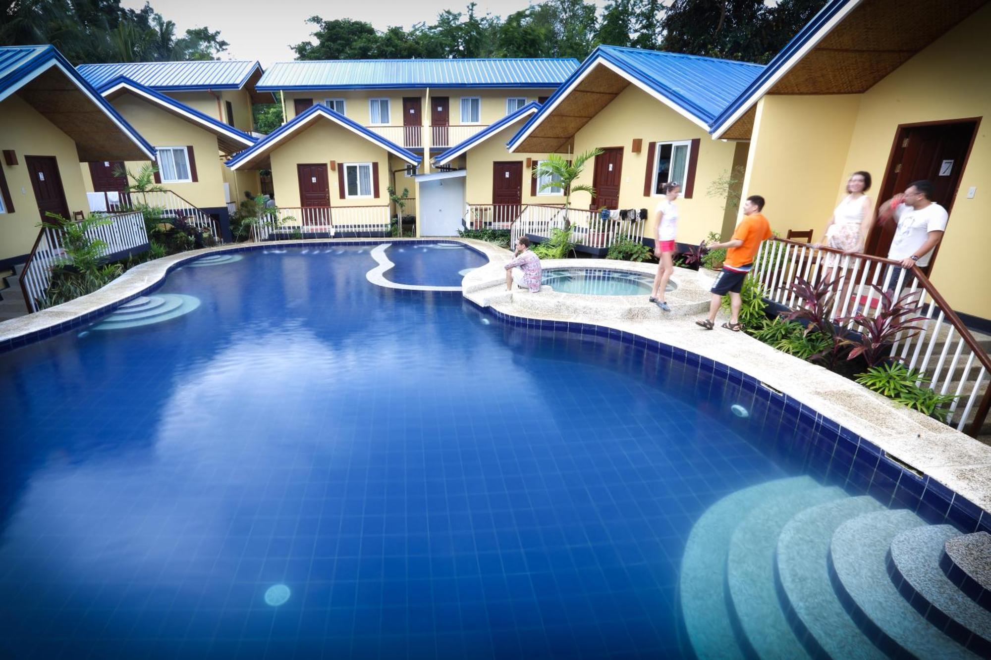 Blue Lagoon Inn & Suites Puerto Princesa Exterior foto